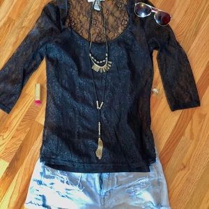 Black lace quarter sleeve top.